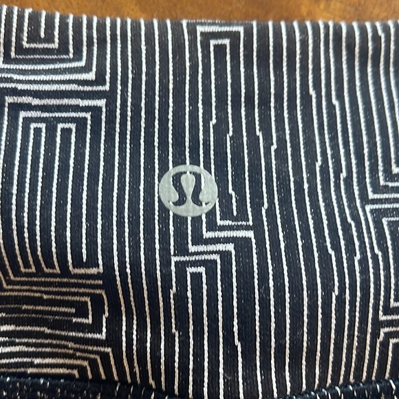 Lululemon cropped leggings in black with white geometric detail. - Picture 3 of 4